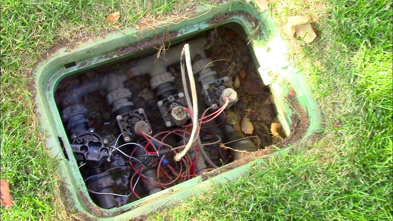 A clean and professional sprinkler valve box manifold installation.
